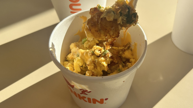 Dunkin' Hash Brown Brisket scramble in white cup