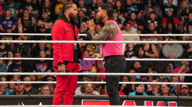 Jey Uso talking to Jimmy Uso in the ring on "WWE Raw."